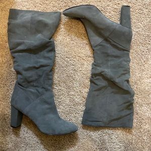 Gray Nine West knee high boots.